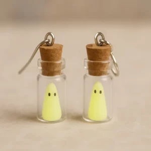 Boucle d'oreille fantome phosphorescent dans une fiole