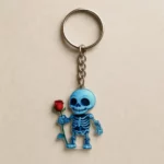 Porte clef squelette avec une rose 2d